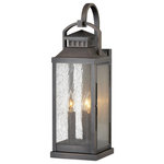 Hinkley Lighting - Revere 3-Light Outdoor Wall Mount, Blackened Brass - Revere is a traditional coach lantern in solid brass with clear seedy glass panels. The glass faux candle sleeves and classic candelabra lamping complete the authentic appearance.&nbsp