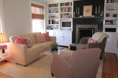 Mid-sized transitional formal and enclosed plywood floor living room photo in Boston with white walls, a standard fireplace, a brick fireplace and no tv