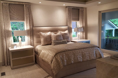 Inspiration for a large contemporary master bedroom in New York with beige walls and vinyl floors.