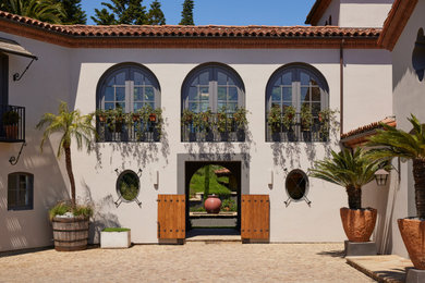 Mediterranean exterior home idea in Santa Barbara
