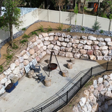 Multi-Tier Boulder Retaining Walls with Fire Pit Patio in Salt Lake, UT