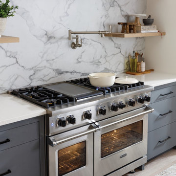 Beautiful kitchen with range and pot filler