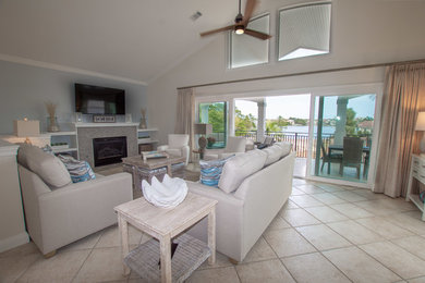 Beach style home design photo in Miami