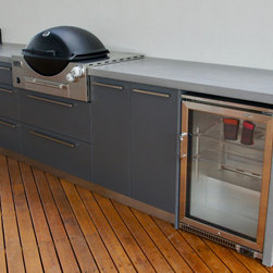 Outdoor Kitchen with a polished concrete benchtop & stainless steel doors. - Kitchen And Dining Furniture