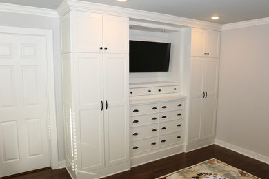 White entertainment center with closets