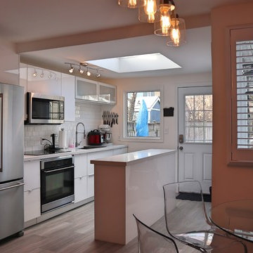 Single wall 18' IKEA kitchen with 6' island. RINGHULT high-gloss IKEA finish.