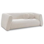 Meridian Furniture - Abbington Boucle Fabric Upholstered Sofa, Cream - Give your room a new look with the chic Abbington sofa in stunning cream boucle fabric. Embrace the richness of its texture and the boxy, geometrically inspired design that adds a touch of contemporary flair. This sofa is not just furniture; it's an aesthetic experience. Complete with an included ball pillow, the Abbington sofa is a sophisticated choice, promising both comfort and style for your living space. Redefine elegance with this eye-catching addition to your home from an unparalleled collection that lets you mix and match to suit your style preferences.