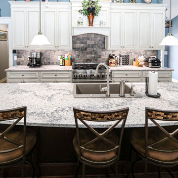 Updated Kitchen with Quartz Countertop, Tile Backsplash and Flooring