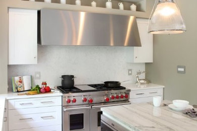 Example of a transitional kitchen design in New York