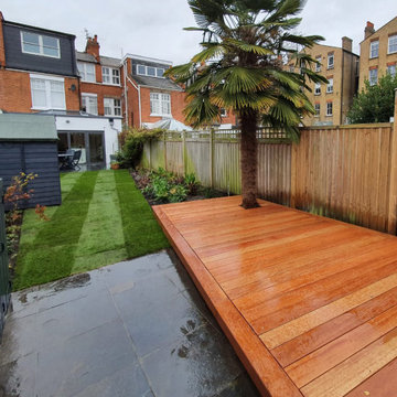Level garden with a raised deck - Teddington