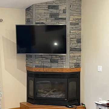 Northern Slate Stacked Stone Electric Fireplace and TV Wall