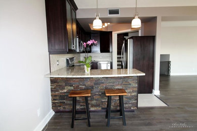 Example of a mid-sized trendy home design design in Ottawa