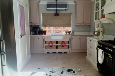 Kitchen - traditional kitchen idea in Other
