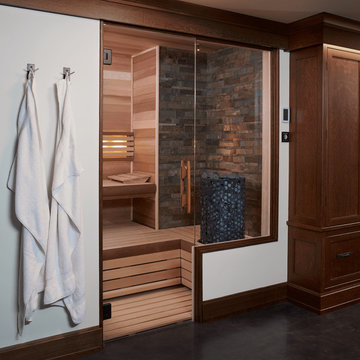 Custom Finnleo Sauna with Himalaya Heater and Stone Wall