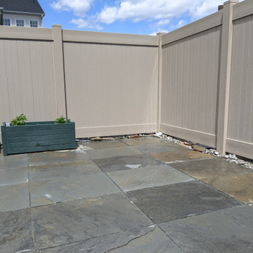 Bluestone Patio, Privacy Fence, and Dry-Stack Retaining Terrace