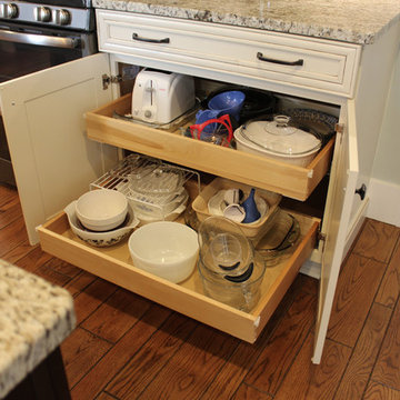 Painted Cream with Brown Glaze Cabinets with Giallo Granite Countertops ~ Sevill