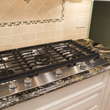 White Tradition Kitchen with a Black Island in Magnolia, DE