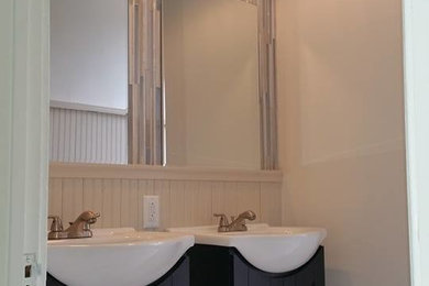 Inspiration for a small contemporary master multicolored tile and glass tile porcelain tile alcove bathtub remodel in Cincinnati with an integrated sink, shaker cabinets, black cabinets, a two-piece toilet and gray walls
