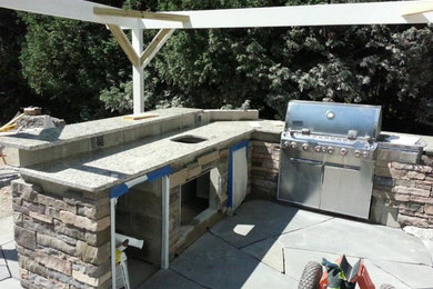 Elegant patio photo in Other