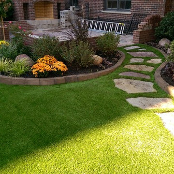 Suburban Backyard - Artificial Turf | Hardscape |  Flagstone | Foliage