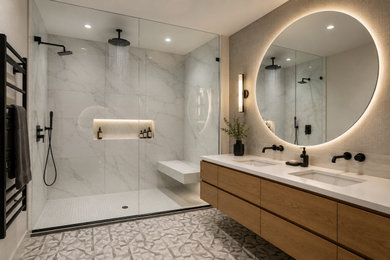 Example of a large classic master white tile and porcelain tile porcelain tile, multicolored floor and double-sink bathroom design in Edmonton with flat-panel cabinets, medium tone wood cabinets, gray walls, an undermount sink, quartz countertops, white countertops and a floating vanity