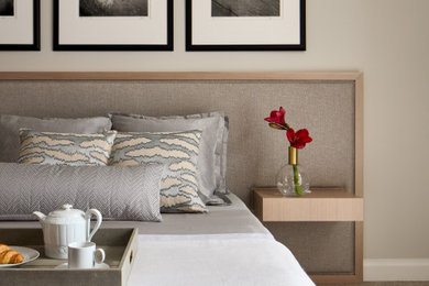 Example of a large minimalist guest beige floor bedroom design in Chicago with gray walls