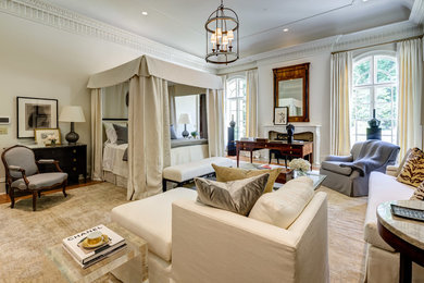 Inspiration for a master bedroom remodel in Atlanta with beige walls