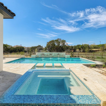 Chic Contemporary Pool with Negative Edge Spa