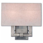 Livex Lighting - Meridian 2-Light ADA Wall Sconce, Brushed Nickel - This wall sconce from the Meridian collection has a clean, crisp look and contemporary appeal. The sleek back plate and angular arm feature a brushed nickel finish. The hand crafted oatmeal fabric hardback shade offers warm light for your surroundings.
