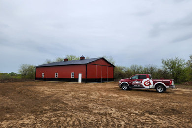 Example of a mid-sized mountain style garage design in Kansas City