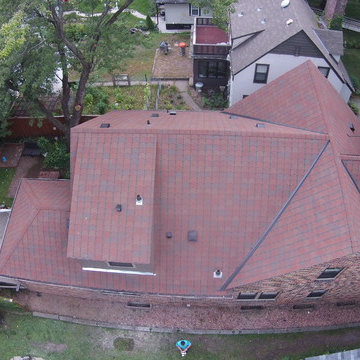 GAF "Designers" collection roof. Style: "Monaco", color: "Valencia Sunset