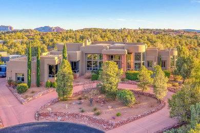 Example of a large southwest home design design in Phoenix