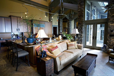 Inspiration for a large craftsman open concept travertine floor living room remodel in Little Rock with beige walls