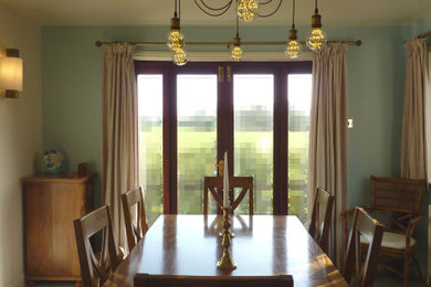 Photo of a medium sized traditional enclosed dining room in Cheshire.