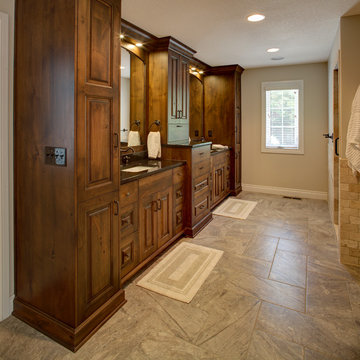 Rustic Alder cabinetry with painted and glazed island.