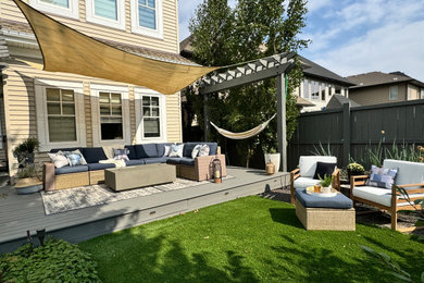 Deck - coastal deck idea in Edmonton with a pergola