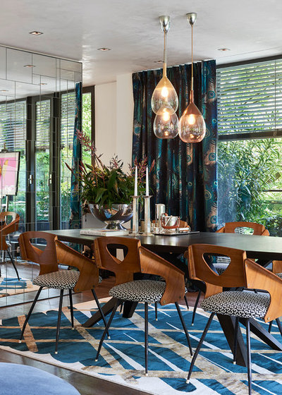 Eclectic Dining Room by Raumkonzepte Peter Buchberger
