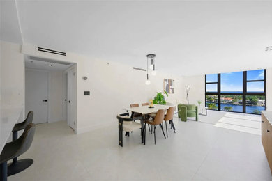 Example of a minimalist dining room design in Miami