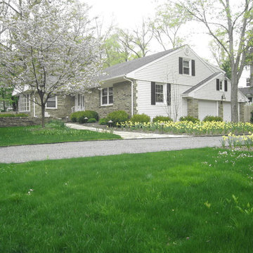 New gravel driveway with steel edging, notice new stone walk
