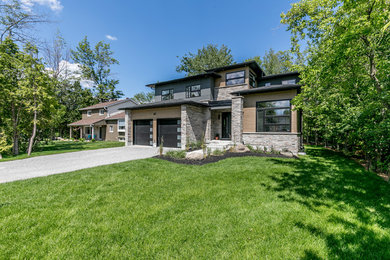 Mid-century modern exterior home photo in Toronto