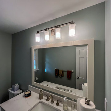 Powder Room with Custom White Vanity and Laventa Snow Quartz Countertop