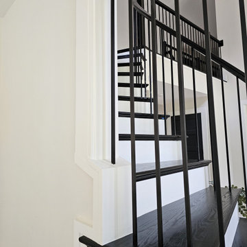 Project #130 | Curved Staircase with Wraparound Balcony