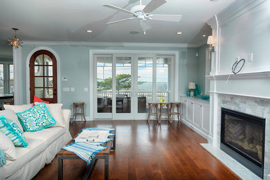Living room - coastal living room idea in Other