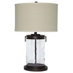 Signature Design by Ashley - Tailynn Clear/Bronze Finish 26" Glass Table Lamp - Light waves ahead. Wowing with a clear wave glass design, this table lamp is delightfully chic and unique. Classic drum shade is perfectly in tune with cylinder shape base.