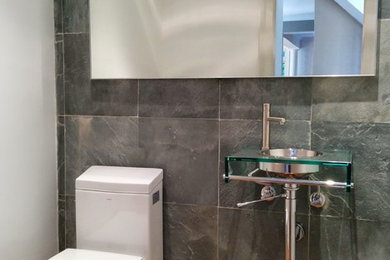 Inspiration for a modern powder room remodel in DC Metro