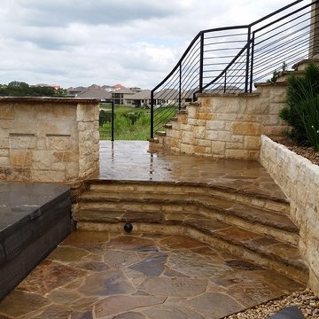 Multi-Level Patio with Hot Tub Water Feature and Boulder Staircase