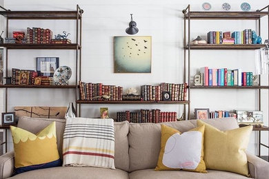 Living room library - mid-sized contemporary open concept living room library idea in Salt Lake City with white walls, no fireplace and no tv