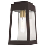 Livex Lighting - Livex Lighting Bronze 1-Light Outdoor Wall Lantern - This updated industrial design comes in a tapering solid brass bronze frame with a sleek, straight-lined look and features clear glass panels.