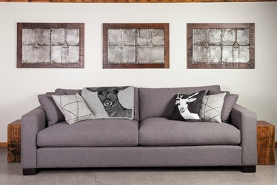 Mid-sized mountain style formal and open concept concrete floor and gray floor living room photo in Vancouver with white walls, no fireplace and no tv