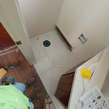 Replace 3 bathrooms and Redo 3 rooms of flooring